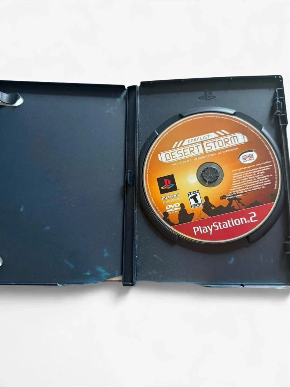 Bundle Of Random Disc Case With PS2 3-Disc Game